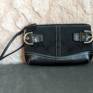 Black Clutch with Leather Accents and Wrist Strap